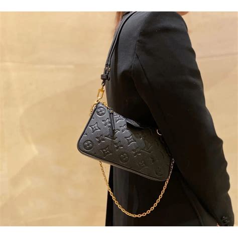 lv easy pouch on strap black|louis vuitton pouch with strap.